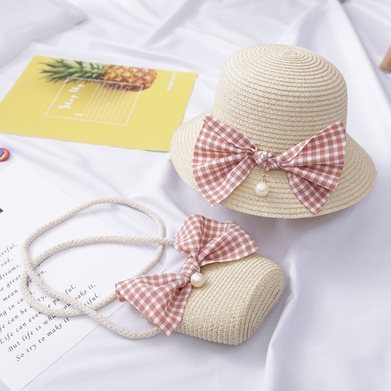 Set 2 món gồm nón cói đính nơ và túi xách tay chống tia UV thời trang đi biển mùa hè cho bé