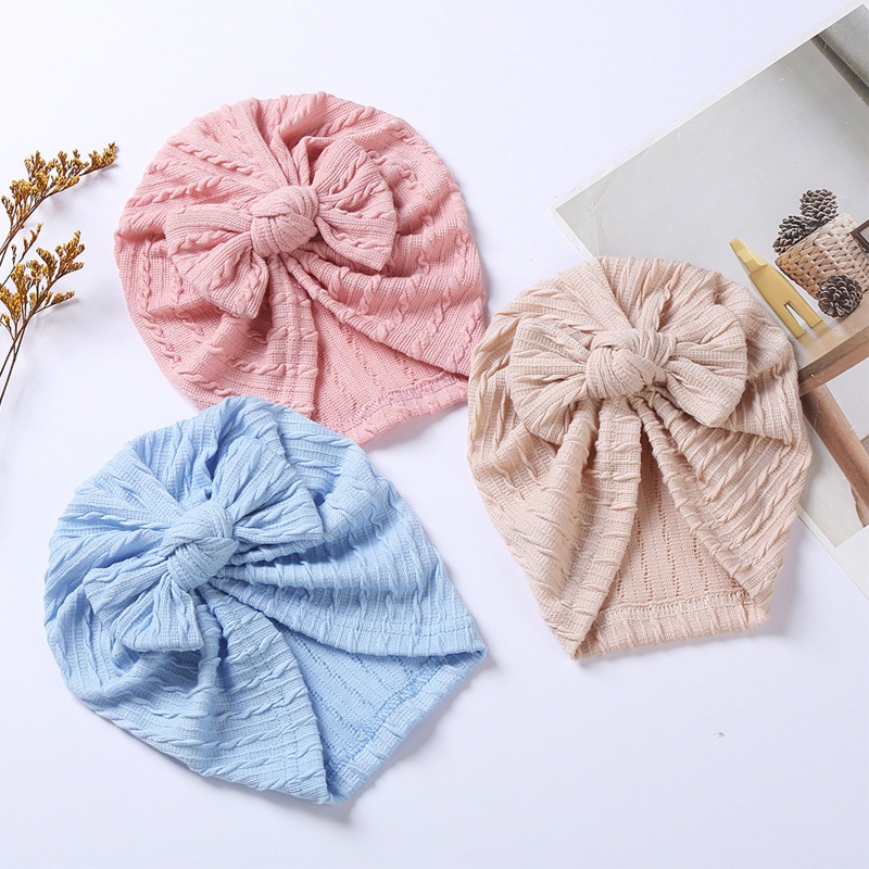 Mũ beanie cotton mềm màu trơn đính nơ dễ thương cho bé sơ sinh