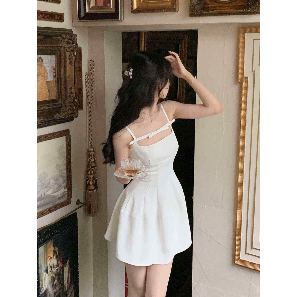 Đầm Ngắn Hai Dây Màu Đen Đính Nơ Phong Cách Pháp Thời Trang Mùa Hè Cho Nữ