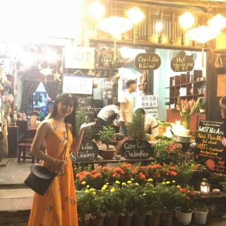 Đầm hoa vàng đi biển