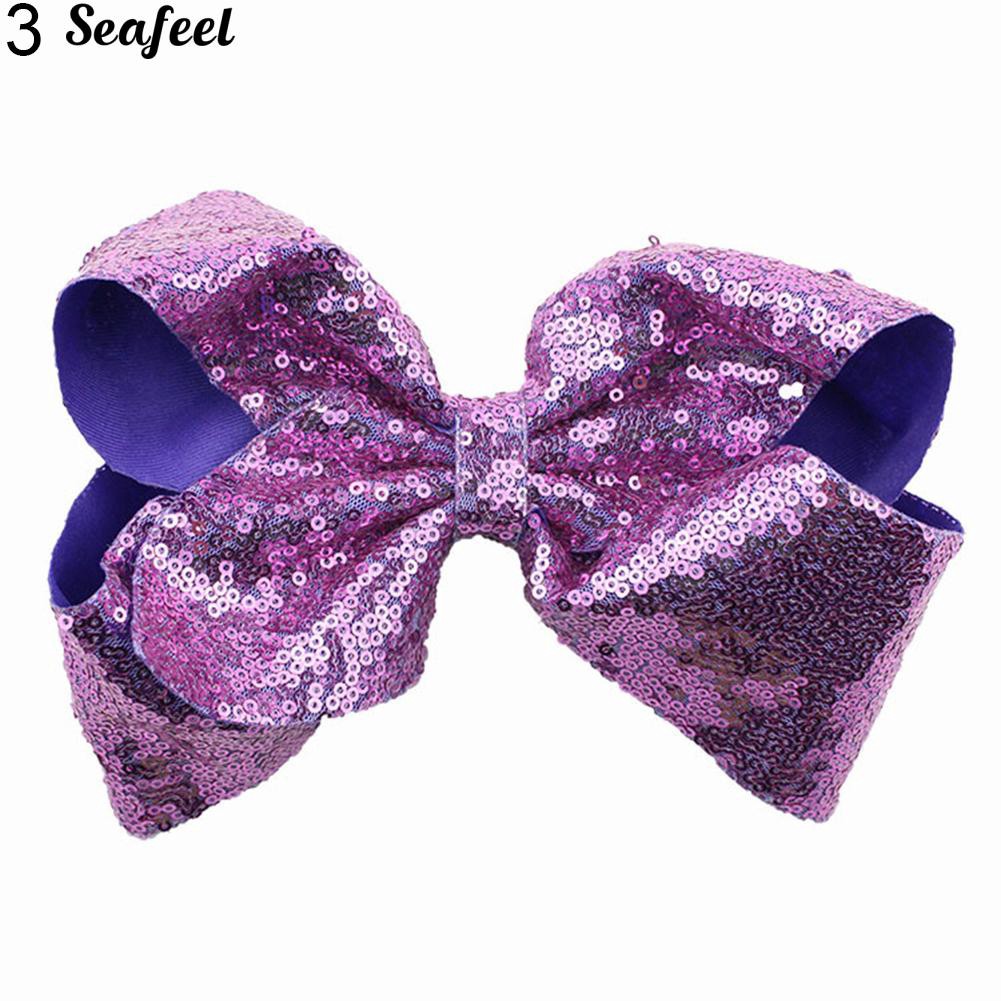 Kẹp tóc hình nơ đính sequin lấp lánh dễ thương dành cho nữ