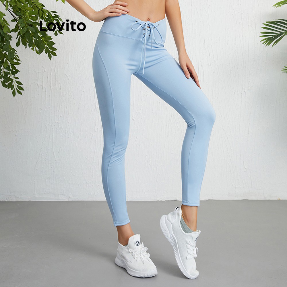 Quần legging thể thao Lovito L09011 dây rút thoải mái nhanh khô (màu đen/xanh dương)