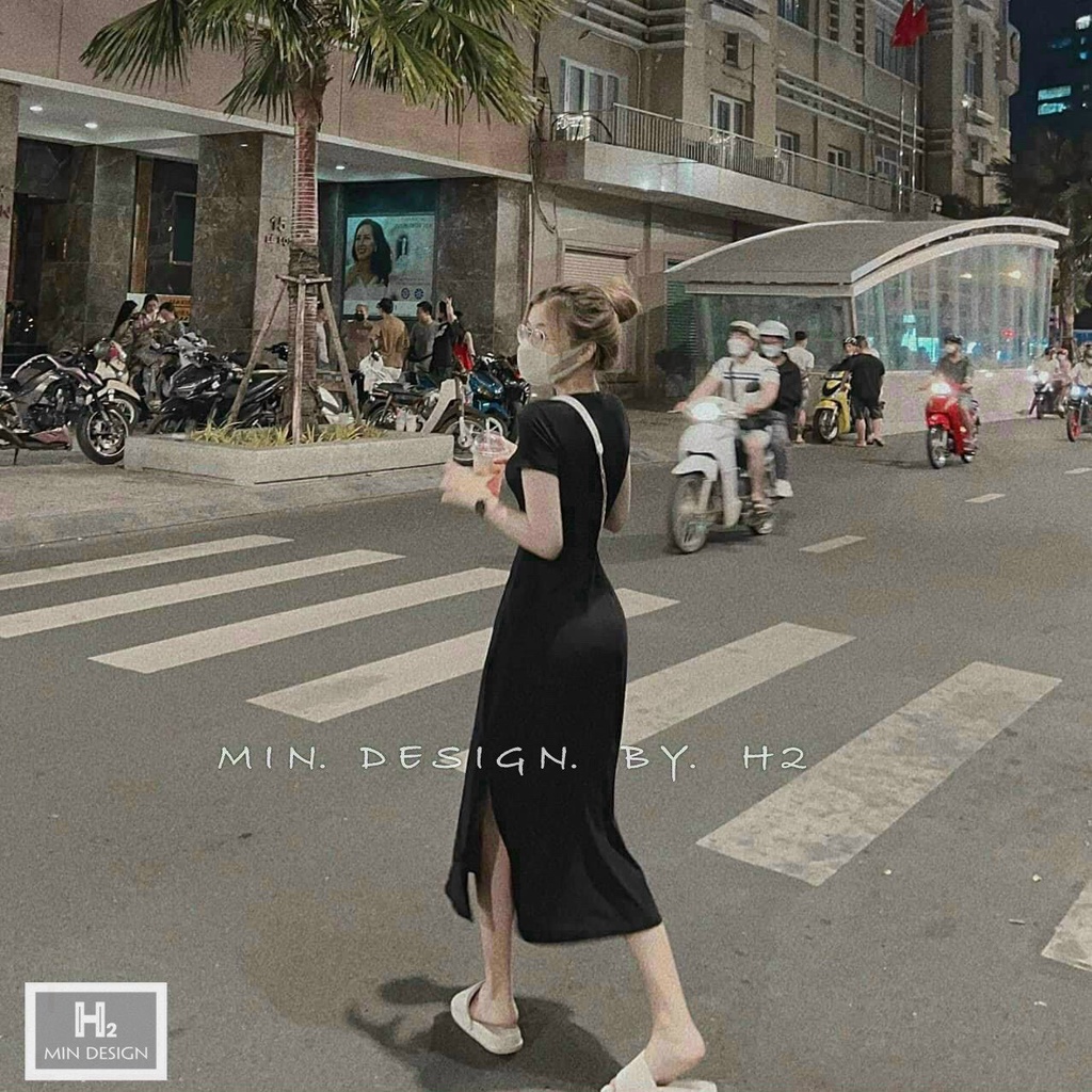 Đầm xòe cổ tròn xẻ tà siêu xinh