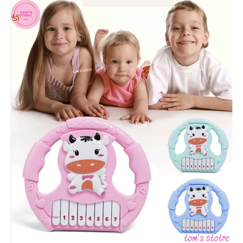 đồ chơi đàn piano cầm tay phát nhạc nhiều âm thanh hình bò sữa đáng yêu cho bé