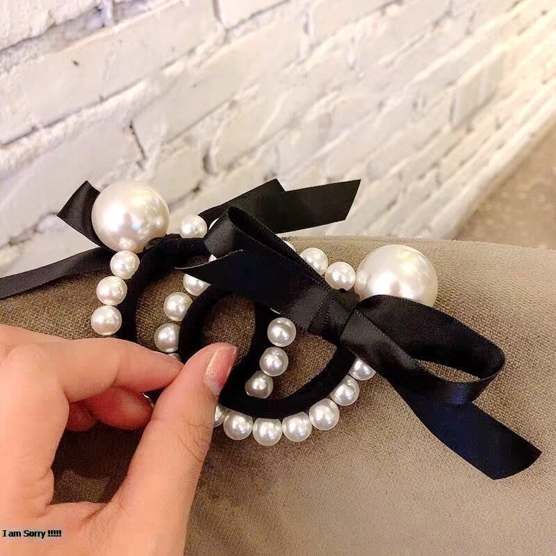 Cột tóc hạt châu trắng ruy băng đen giá rẻ nữ tính CT130