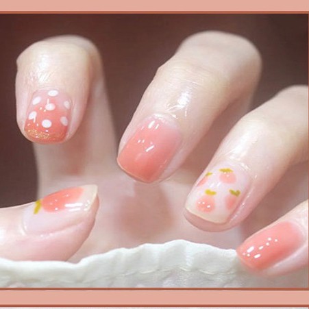 Bộ móng tay giả kèm keo họa tiết quả đào Hin Nail