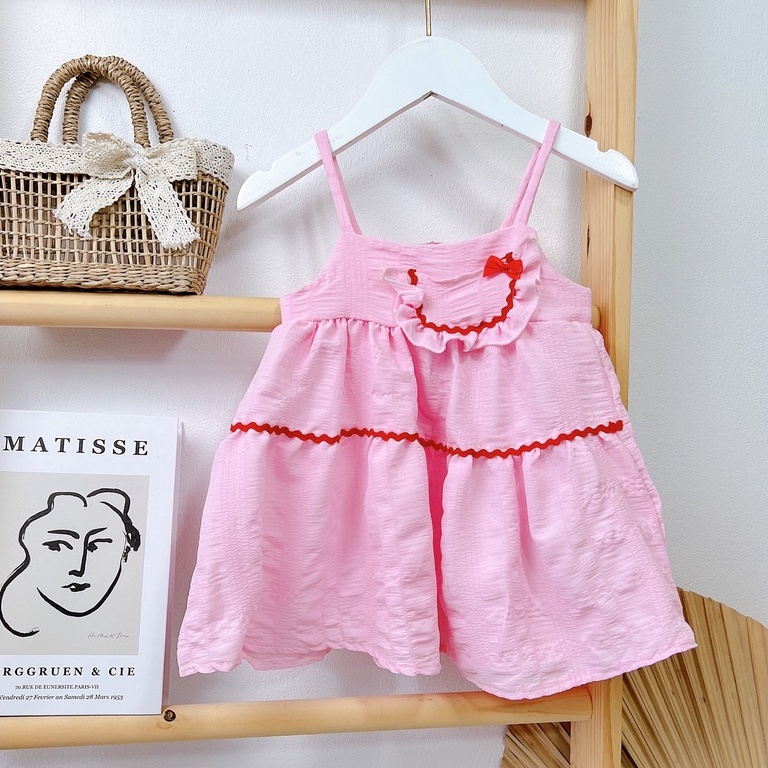 Váy 2 dây bé gái có đính túi trước ngực dễ thương cho bé