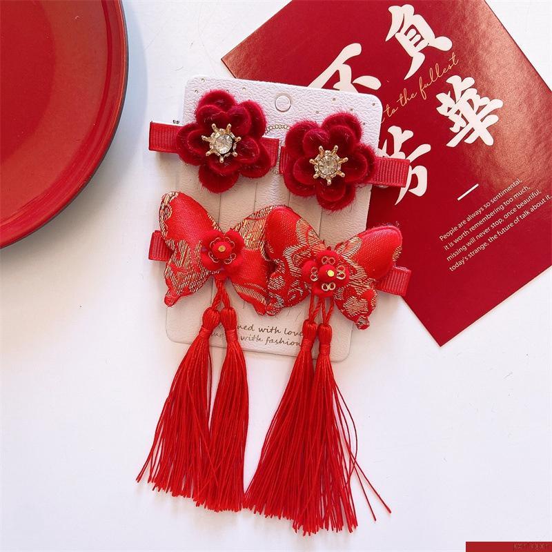Set 4 kẹp tóc tua rua màu đỏ may mắn dành cho bé
