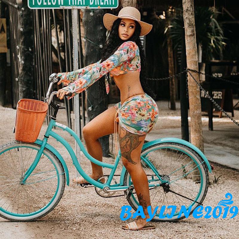 Bộ đồ 2 món áo croptop tay dài cổ chữ V buộc dây in họa tiết hoa + chân váy dây rút thời trang đi biển cho nữ | BigBuy360 - bigbuy360.vn