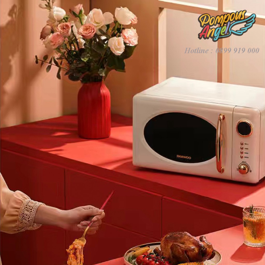 Lò vi sóng điện DAEWOO DY-WB02 màu trắng / đỏ viền vàng ,dung tích 20L bảo hành 12 tháng