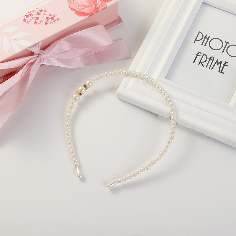 Cài tóc ngọc trai xinh xắn cho bé gái