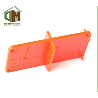 Cữ định vị khoan bản lề bật