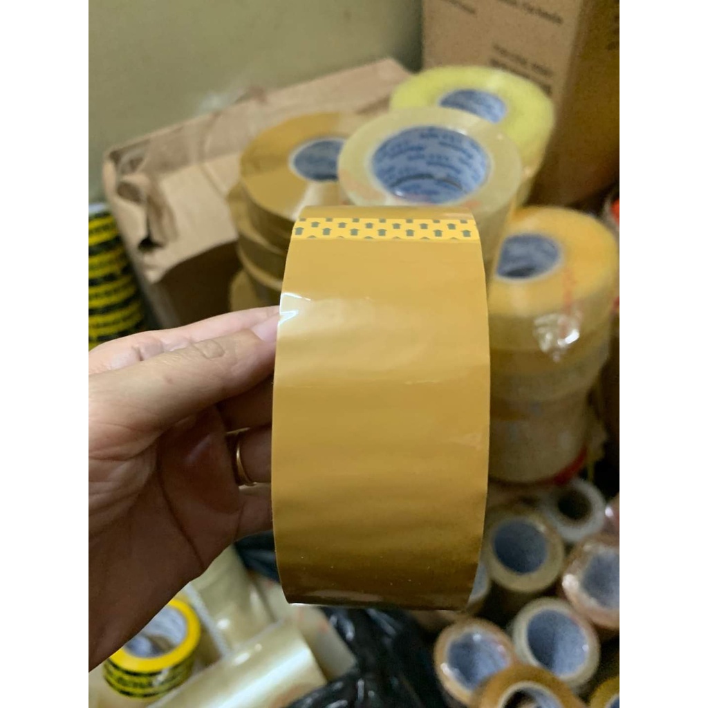 Băng keo đục 100y ( 1 cuộn) siêu dính để dán thùng giấy carton đóng hàng giá rẻ tận xưởng giao hỏa tốc nhận hàng ngay