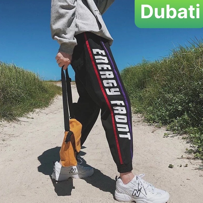 QUẦN JOGGER THỂ THAO VIỀN CHỮ ĐÙI CHẤT NỈ DA CÁ NAM NỮ CÓ BO PHONG CÁCH SANG CHẢNH MỚI-DUBATI FASHION