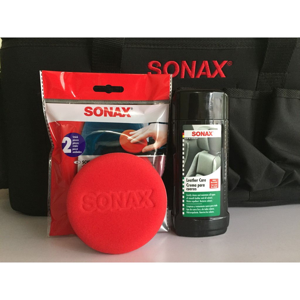 Combo kem bảo dưỡng làm mới da nội thất ô tô và 1 miếng mút xoa hóa chất Sonax Leather care lotion 291141