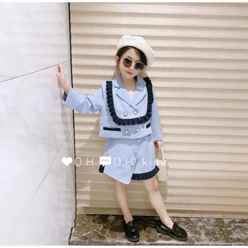 Set vest xanh viền bèo đen bé gái