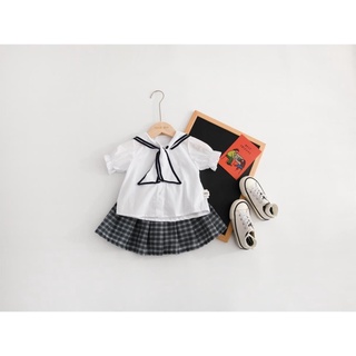 Set quần áo uniform Hàn Quốc cho bé trai, bé gái áo trắng quần kẻ caro mẫu mới 2022 chất liệu cotton thấm hút mồ hôi [HS