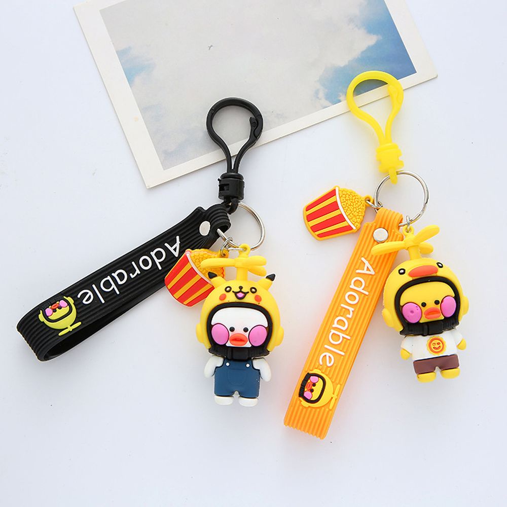 Móc khóa hình vịt con đội nón bảo hiểm xinh xắn