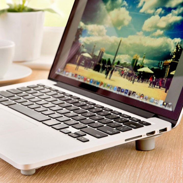 Bộ 4 chân đế tản nhiệt máy tính xách tay laptop silicon nhỏ gọn tiện lợi di chuyển nâng cao máy youngcityshop 30.000