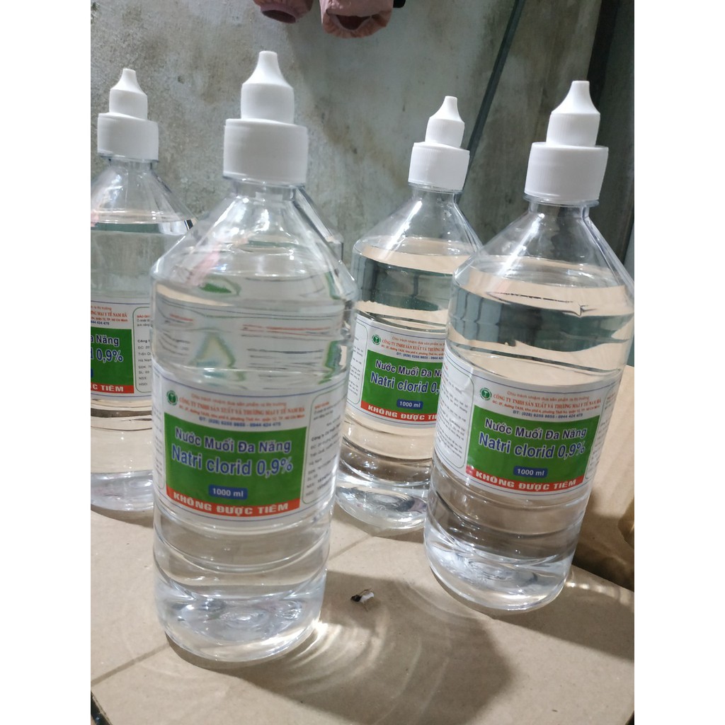 Nước muối sinh lý Natriclorid 0.9% 1000ml nước xúc miệng rửa mặt làm sạch mụn( 1 chai)