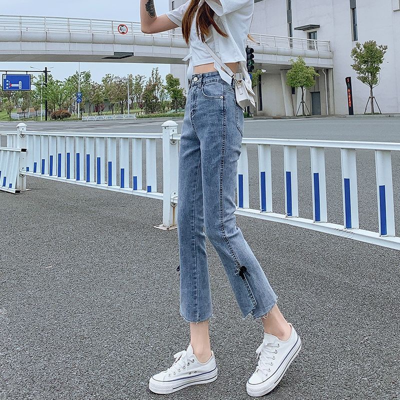 Bow stretch micro-horn forked jeans women's high waist, abdomen, body-building, nine-cent pants, thin style in summer.