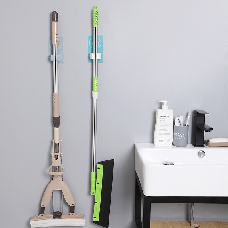 Móc dán tường treo chổi tiện lợi