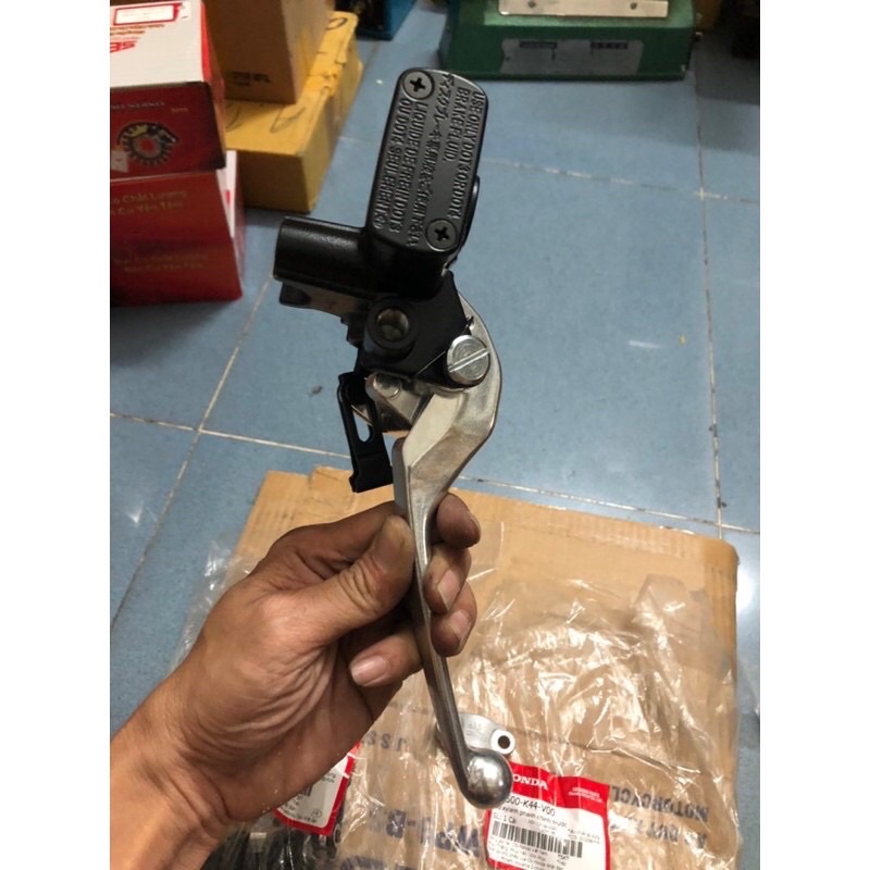 Cùm tay thắng dầu Ab 110/ 125 + Vision đời mới  zin hãng Honda