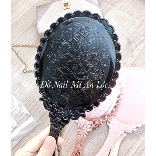 Gương soi cầm tay