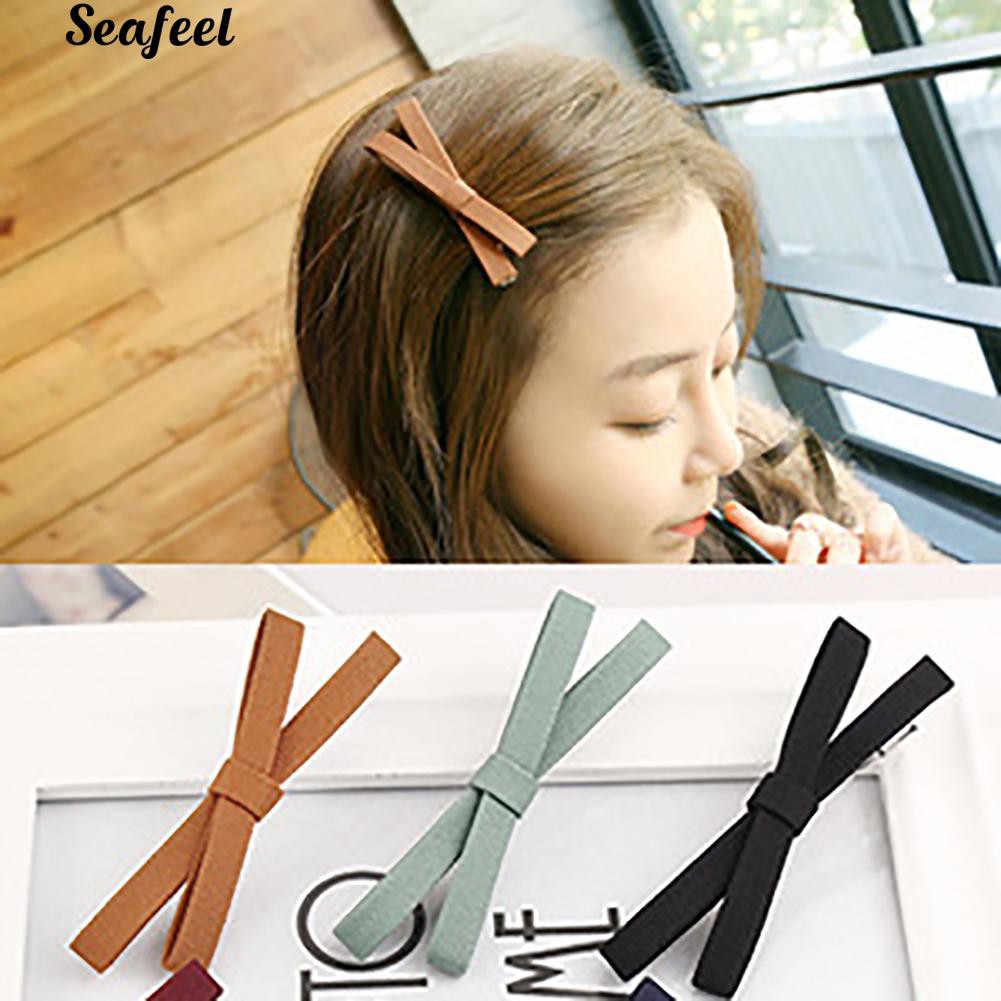 Kẹp tóc mặt hình nơ màu trơn cổ điển