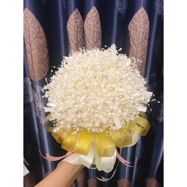 Hoa cầm tay cô dâu,chú rể hạt ngọc trai nhựa