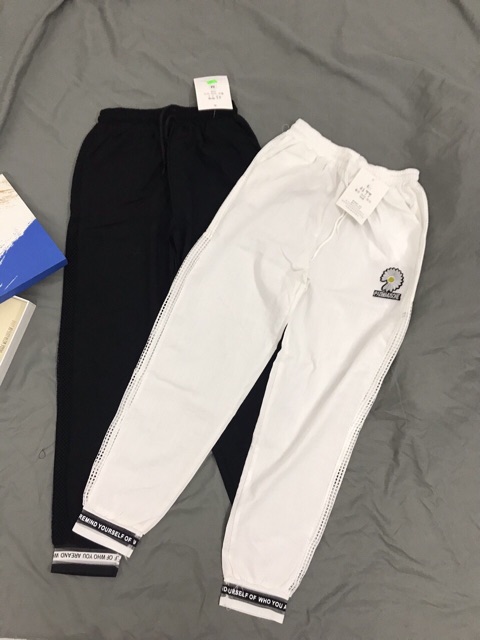 Quần jogger nữ thêu hoa cúc xinh
