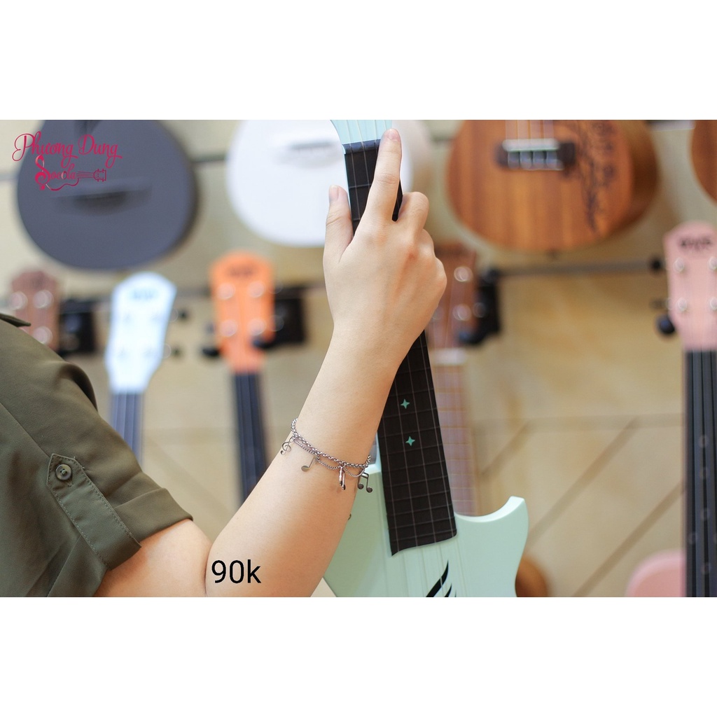 Vòng tay 4 nốt nhạc - màu vàng và màu trắng