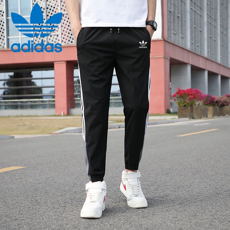 Adidas Quần chạy bộ Ống Rộng Phối Sọc Mau Khô Dành Cho Nam