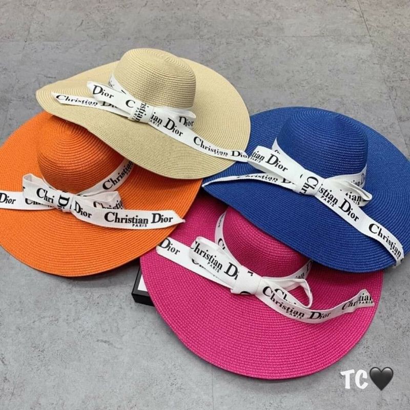 Mũ cói đi biển vành rộng dây nơ Dio trắng siêu sang