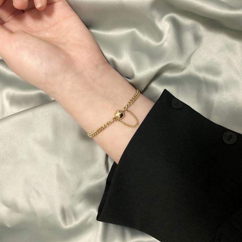 Lắc Tay Dây Xích Trái Châu Titan Ko Han Rỉ TT 3864 - màu vàng