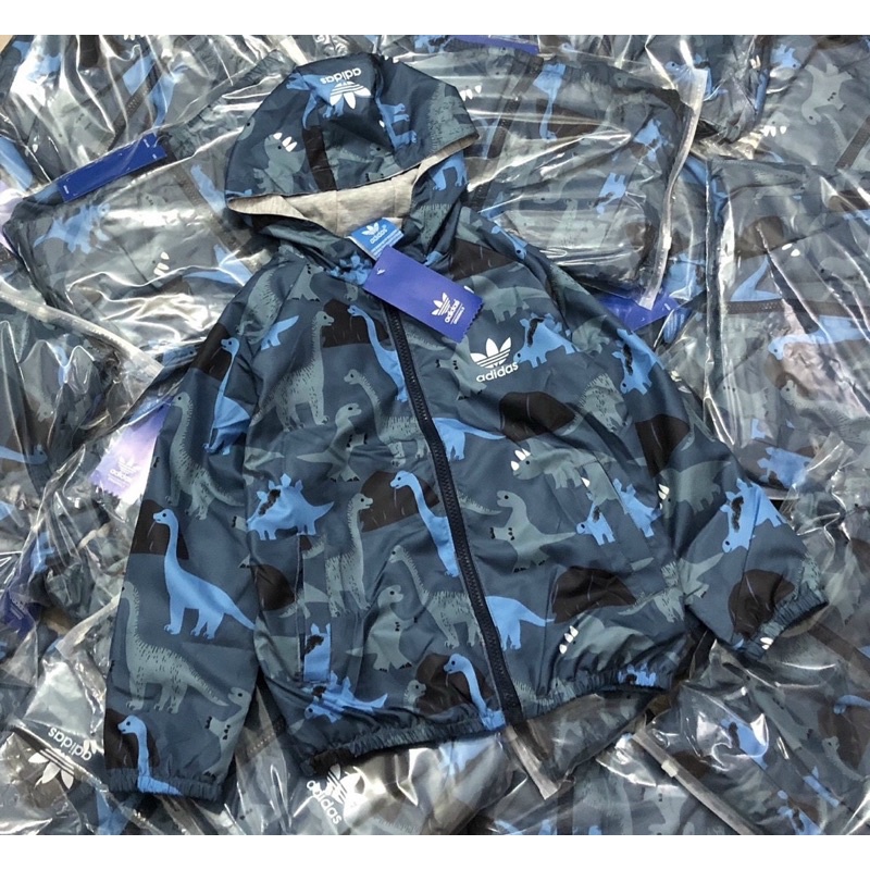 Áo khoác gió adi.das cho bé trai hình khủng long size từ 12-35 cân