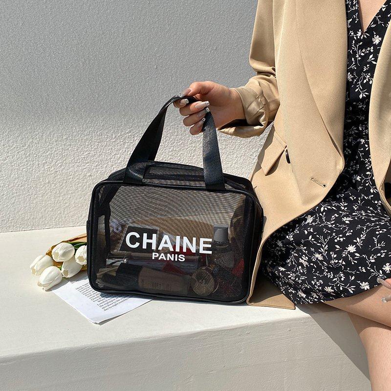 Túi lưới đựng mỹ phẩm in chữ cái màu trắng và đen phong cách Âu Mỹ thanh lịch sành điệu