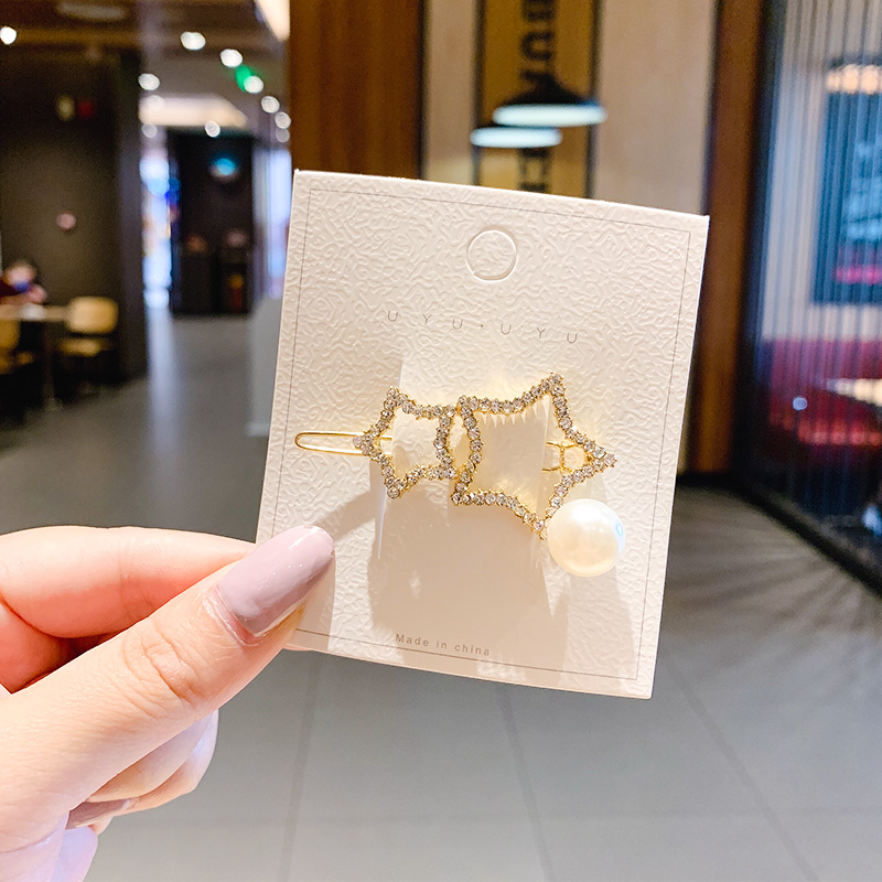 Kẹp tóc đính đá hình ngôi sao xinh xắn dành cho nữ