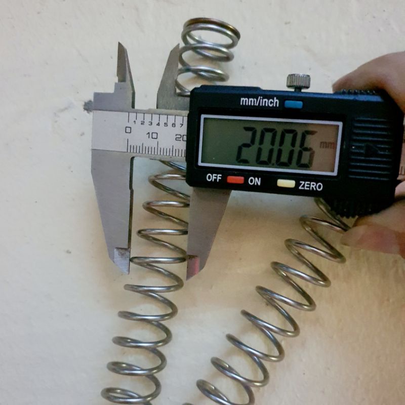 Lò xo inox 20*2*300mm