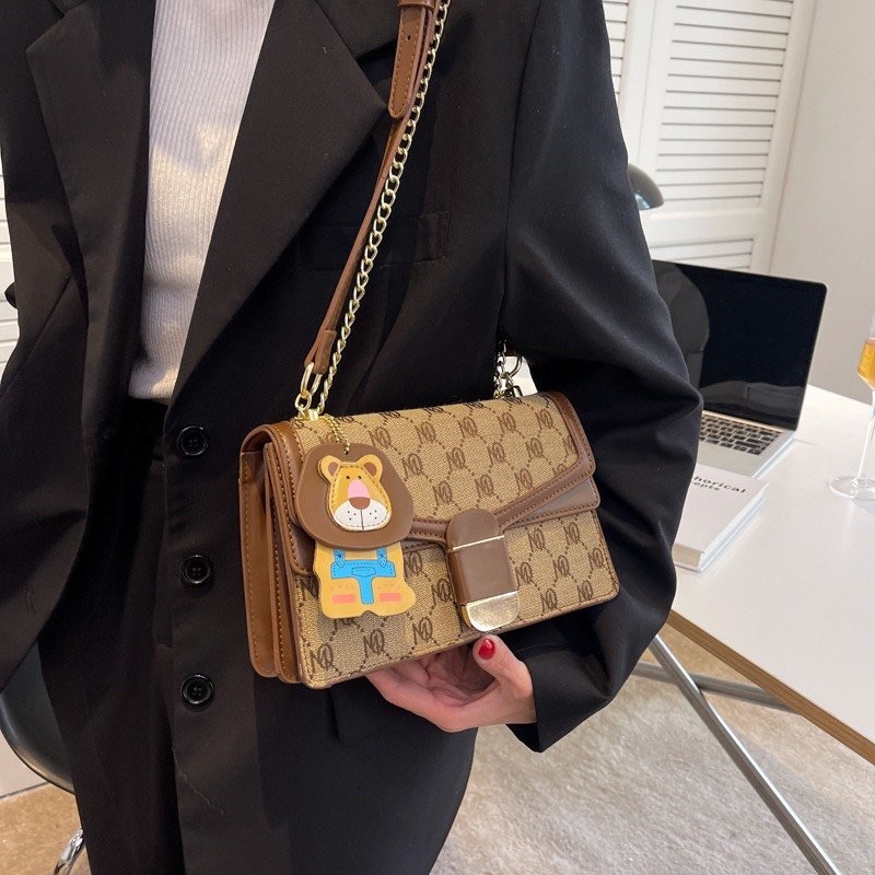 Túi MQ KÈM CHARM SƯ TỬ