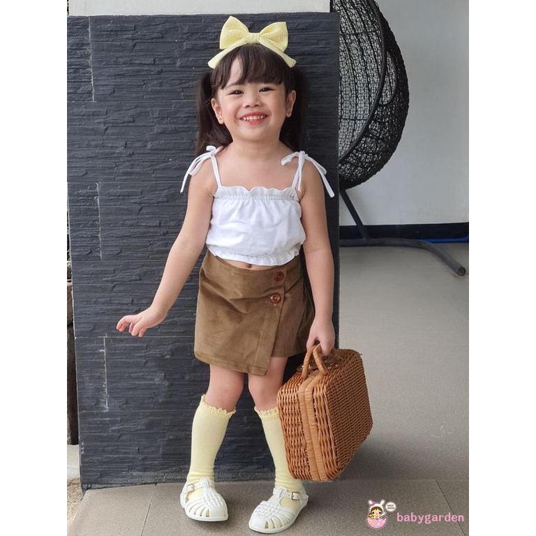 Bộ áo hai dây + chân váy mini co giãn màu nâu cho bé gái