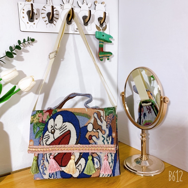 Túi thổ Cẩm đeo chéo tua rua hộp phong cách