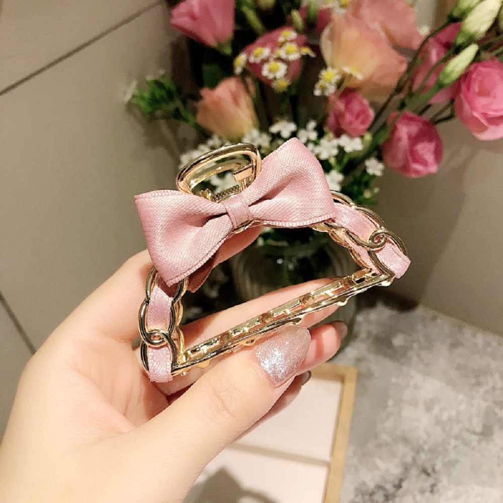 Kẹp tóc hình nơ làm từ hợp kim màu trơn thời trang nữ dễ thương