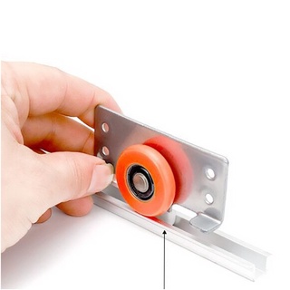 Bánh xe lùa cửa tủ 06378 chính hãng
