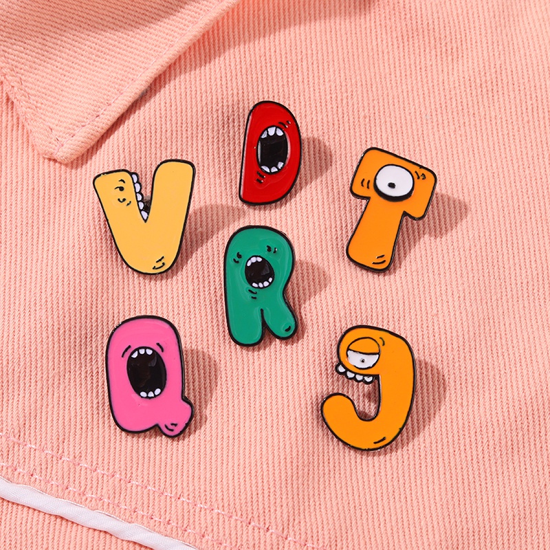 Huy Hiệu Cài Áo Hình 26 Chữ Cái Tiếng Anh Họa Tiết Hoạt Hình Ngộ Nghĩnh