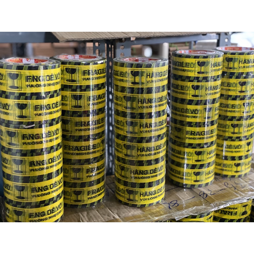 [SỈ/LẺ Cuộn 500Gram] Băng Dính Logo (Vàng) In Chữ HÀNG DỄ VỠ XIN NHẸ TAY/Băng Keo Hàng Dễ Vỡ Cảnh Báo Vận Chuyển Giá Rẻ