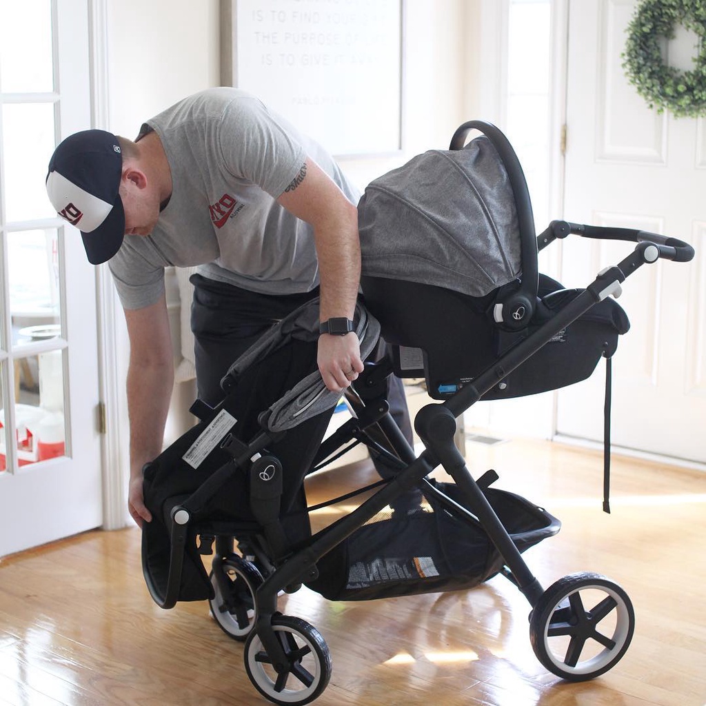 Bộ xe đẩy đôi xe đẩy nôi xách 3-in-1 Evenflo Gold Pivot Xpand Travel System