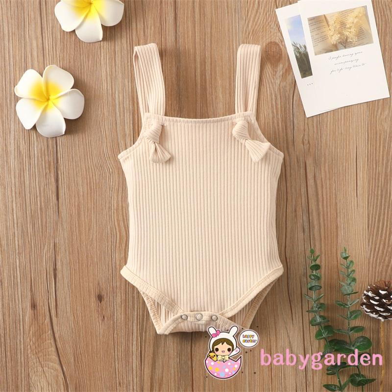 Áo liền quần có dây và nút màu trơn chỉnh được cho bé gái 0-24 tháng