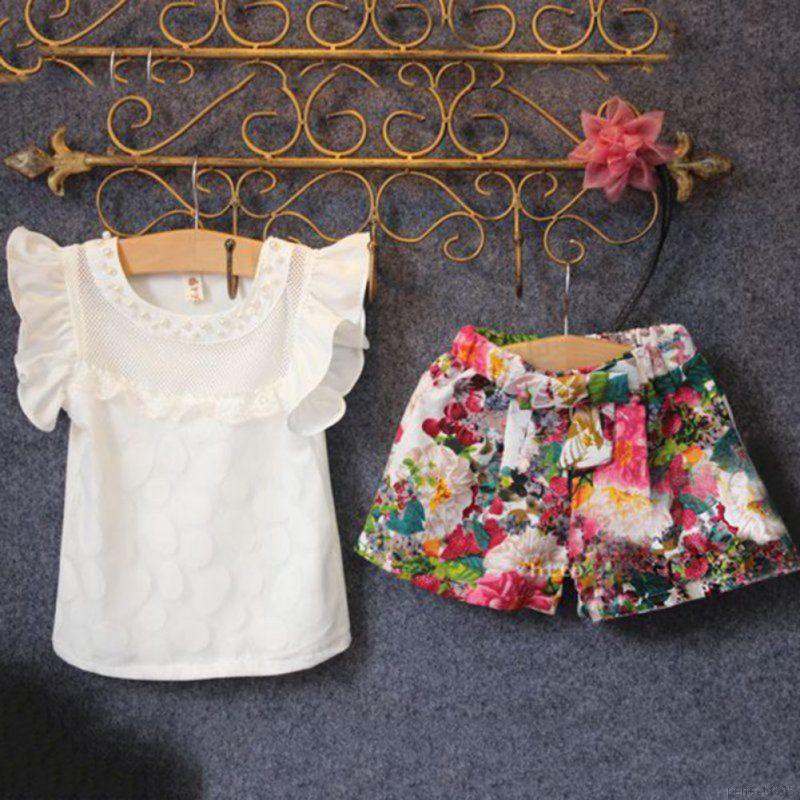 Bộ quần áo gồm áo thun + quần hoa cho bé gái