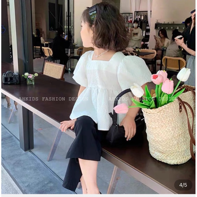 Set áo xốp trắng quần loe đen cho bé gái